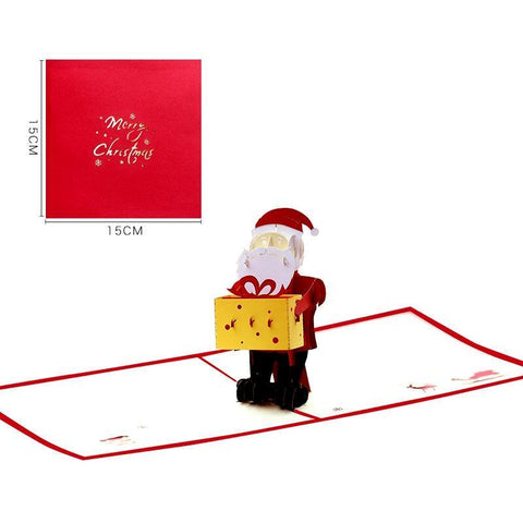 Santa Claus Holding A Gift Pop-up Card - greetingpopup